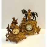 Two gilded bronze French mantle clocks one with farrier and horse to top A/F.