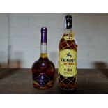 A bottle of Courvoisier cognac and a bottle of Terry Centenario