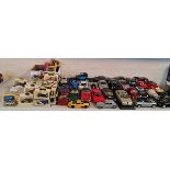 A large collection of diecast cars boxed and loose.