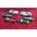 Two Crescent Toy Co racing cars together with four Dinky Toy racing cars repainted.