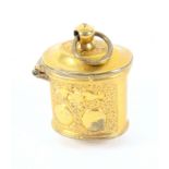 An 18th Century gilt metal thimble or patch box from a chatelaine, the body with panels of leaves