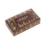 A maroon leather needle packet box, with gilt tooled decoration, the canted lid inscribed 'Needles',