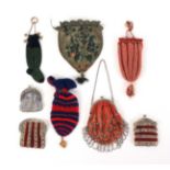 Eight bags and purses, comprising a knitted green and black example in the form of a sock, 14cms,