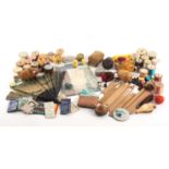 A mixed lot - sewing, comprising a selection of pin cushions, collection of reel holder parts mostly