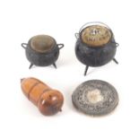 Three pin cushions and a pin poppet/thimble case, comprising two Irish bog oak cauldron examples,