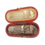 A good example of a filigree silver thimble, tape measure and scent bottle in original leather case,