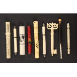 Nine needle cases, comprising eight bone examples, one in the form of a key, 8.7cms, another in horn