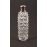 A 19th Century cut glass scent bottle, with unmarked silver screw top, complete with stopper, 10.