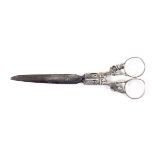 A pair of early 19th Century silver mounted scissors, Dutch, the oval section steel blades to floral