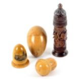 Four thimble cases, comprising a Tyrolean carved wooden standing example fitted with reel and needle