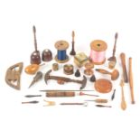 A mixed lot - mostly wooden sewing and crafts tools, comprising various bobbins, hat stretcher,