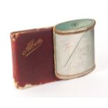 A small booklet and a sketch and autograph album, the booklet in the outline form of a cotton reel