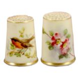 Two Royal Worcester porcelain puce ground thimbles, unmarked, one painted with a red breasted bird