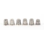 Six English silver thimbles with raised letter friezes, comprising Aylesbury/Portsmouth/York/