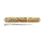A late 18th Century silver gilt filigree bodkin case with bodkin, the cylinder with elaborate