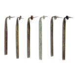 A scarce group of six 19th Century brass straw splitters, each approx. 7cms contained in a tobacco