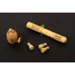 Four bone and vegetable ivory pieces incorporating Stanhopes, comprising a pierced cylinder needle