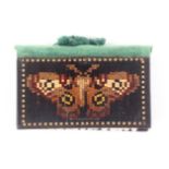 A Tunbridge ware needle book, one board with a mosaic panel of a butterfly, the reverse in geometric