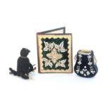 Two beadwork needle cases and a beadwork bear, comprising a cardboard needle book the green velvet