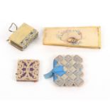 Four card sewing accessories, comprising a stitched, stacked and pierced card needle book, blue