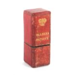 A red leather needle packet box, of square section titled in gilt 'Palmers Patent' below a crown,