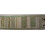 A very extensive educational strip sampler, initialled and dated 'ER 1917' with multiple panels of