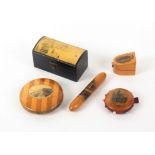 Mauchline ware - five pieces, comprising a black ground dome top reel box (Keepsake/sailing ship),