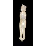 A fine Palais Royal mother of pearl figural needle case, in the form of a young man wearing a peaked