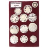 A display of twelve large pierced and carved Bethlehem mother of pearl buttons, largest 4.8cms