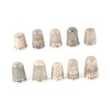 Ten English hall marked silver thimbles, some with decorative friezes. (10) From the collection of
