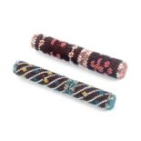 Two good bead work covered cylinder needle cases, one with bone core, one with wooden core, 9.2