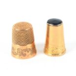 Two gold thimbles, comprising an example with leaf engraved frieze dated 'Feb 27th 1910', internal