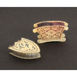 Two cut and pierced bone pin cushions, one in the form of a jardiniere, 4.8cms, and another of