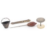 Four attractive sewing accessories, comprising a silver leaf decorated pin basket with wire swing