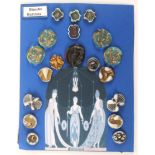 A display of nineteen Bimini buttons, largest 4cms. From the collection of the late Christine