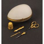 A French etui for a child or doll, circa 1880, the frosted glass and gilt mounted egg form case