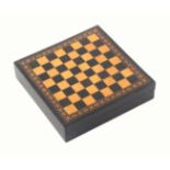 A rare Tunbridge ware travelling draughts box marked for Thomas Barton, rosewood or ebony, the box