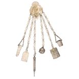 A plated metal chatelaine, the clip with classical style mount to six pierced link chains to a