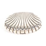 An unusual silver scallop shell form sewing etui, with press catch and hinged to reveal a blue