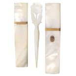 Two Palais Royal mother of pearl needle cases and a stiletto, both needle cases of rectangular