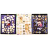 Three displays of 19th Century and later mother of pearl and abalone shell buttons, including