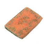 An early 19th Century silk wallet, probably French, the salmon pink ground embroidered with silk