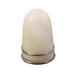 An early 19th Century French mother of pearl thimble, the plain frieze between gilt metal bands.