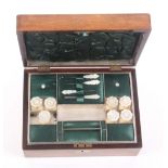 A rosewood sewing box of plain rectangular form, circa 1860, the lid and front with mother of