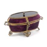 A charming French miniature sewing box for a child or doll, circa 1860, of oval form with gilt metal
