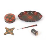 Tartan ware - five pieces, comprising a scalloped oval pin dish (Leslie), 13cms, a circular box (