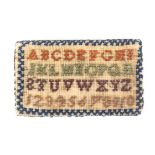 A rare 19th Century sampler form rectangular pin card, executed in variant coloured cross stitch