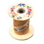 A scarce mother of pearl top reel, bone base, wooden core with printed label 'I.P. Clarke's