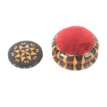 Tunbridge ware - two pieces, comprising a circular stick ware pin cushion with printed circular