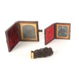 Two Victorian leather cased photographs and a gold mounted plaited hair bracelet, the clasp engraved